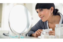 Pregnant woman looking at her skin Pregnant woman looking at her skin