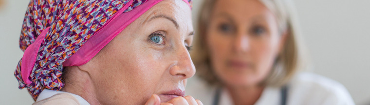 Female chemotherapy patient with her doctor talking about myeloma. Female chemotherapy patient with her doctor talking about myeloma.