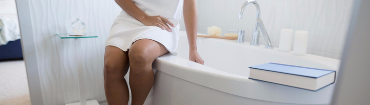 Woman preparing a bath to help treat Bartholin's cysts. Woman preparing a bath to help treat Bartholin's cysts.