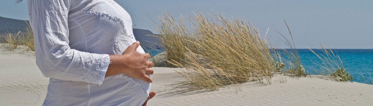 Pregnant woman on beach Pregnant woman on beach