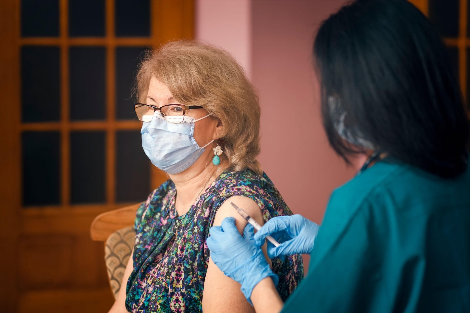 Woman receiving Covid vaccination