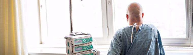 Image of advanced cancer patient facing hospital window, to help illustrate an article on lung cancer. Image of advanced cancer patient facing hospital window, to help illustrate an article on lung cancer.
